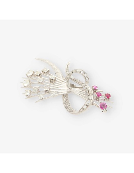 Broche oro blanco y bri