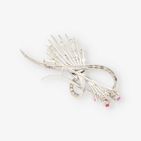 Broche oro blanco y bri