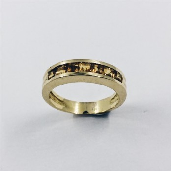 Anillo media alianza de oro y topacios