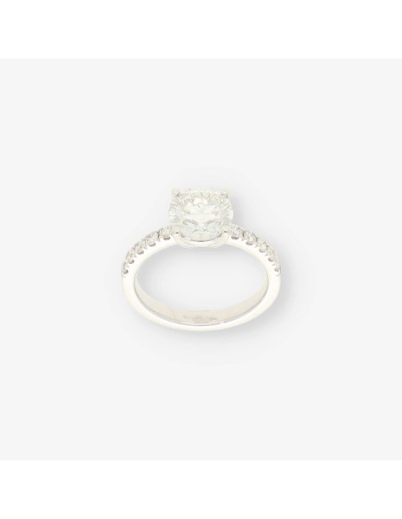 Anillo oro bl. bri central aprox 2,30 Qt