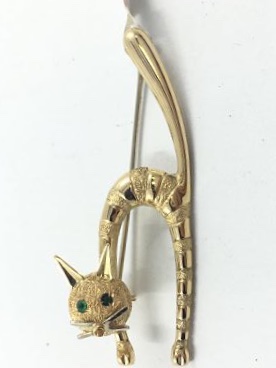 Broche gato en oro con ojos de esmeralda